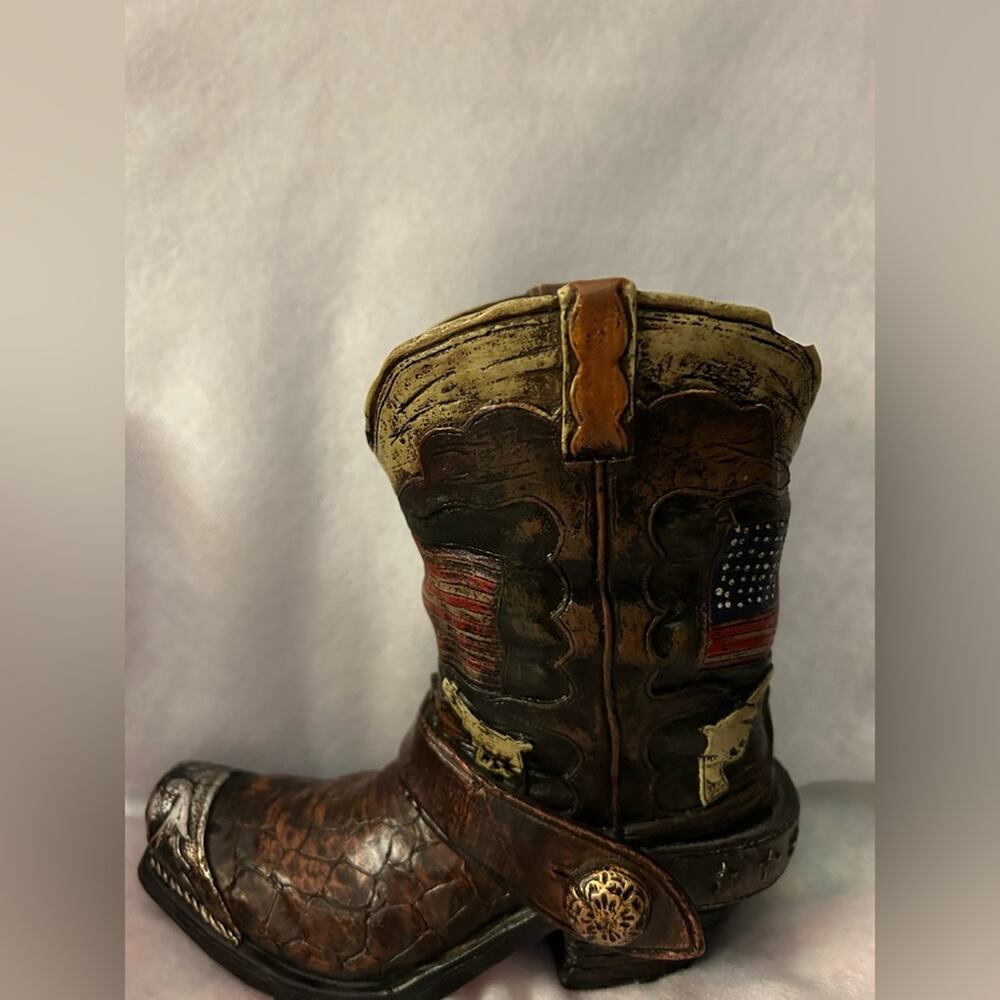 7 inch tall boot bank. Brown in color with flags